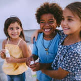 Three girls play together